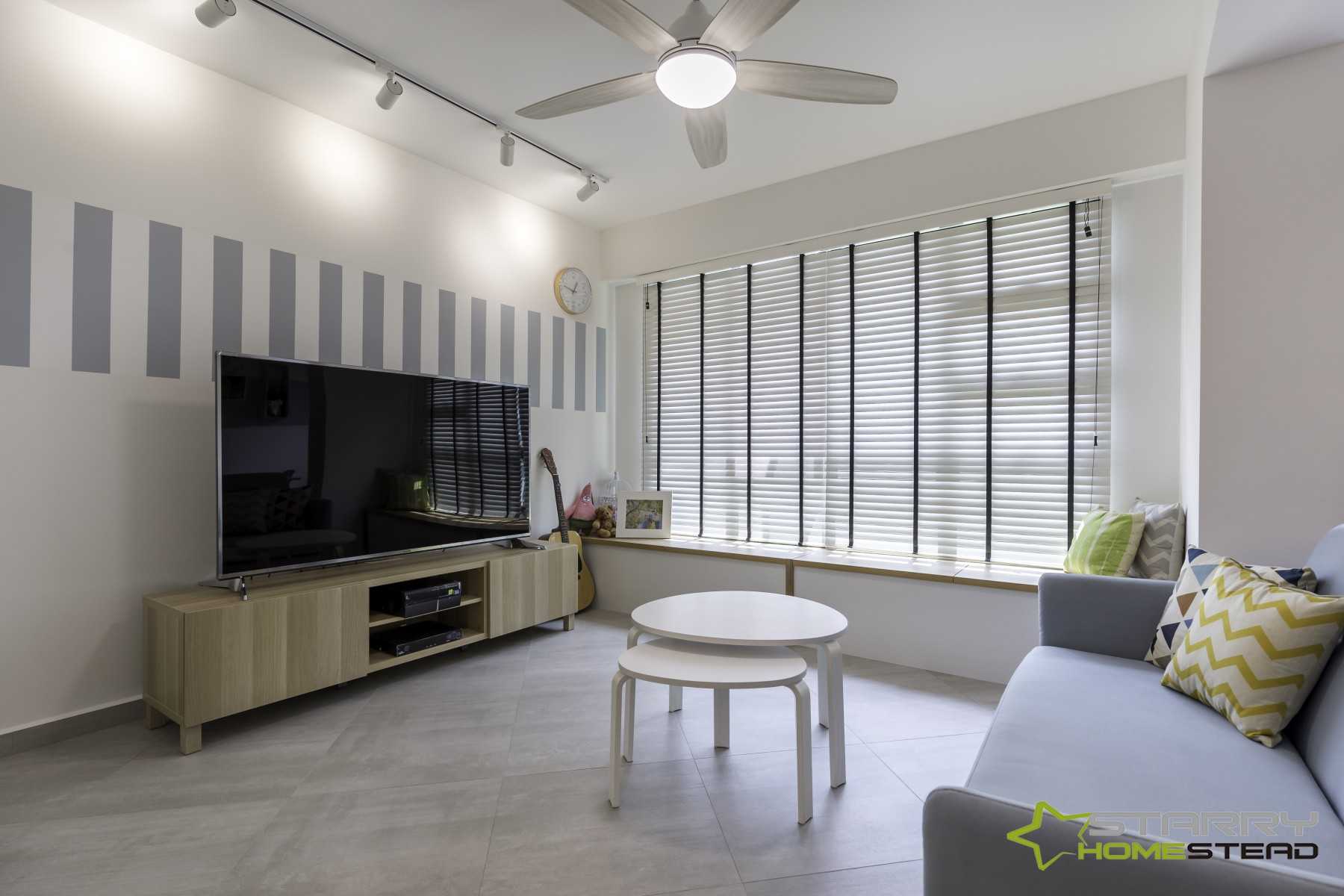 Scandinavian Living Room with TV Console and Bay Window
