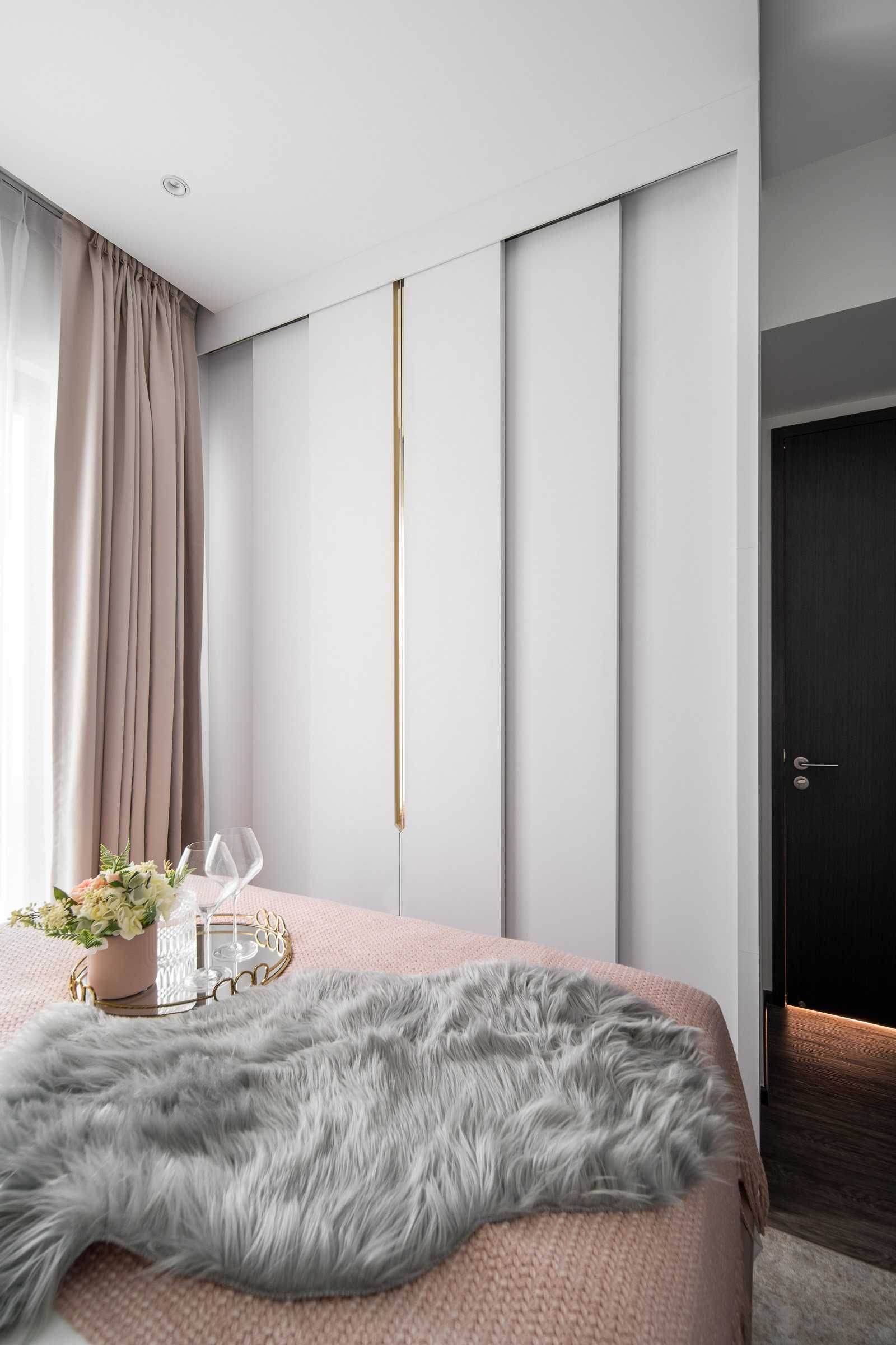Modern Bedroom with Cove Lighting and Wardrobe