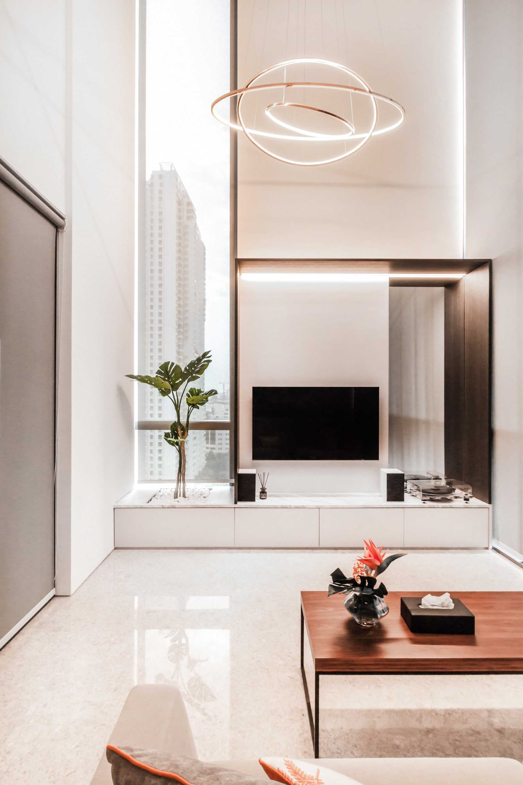 Modern Living Room with Cove Lighting and Downlights