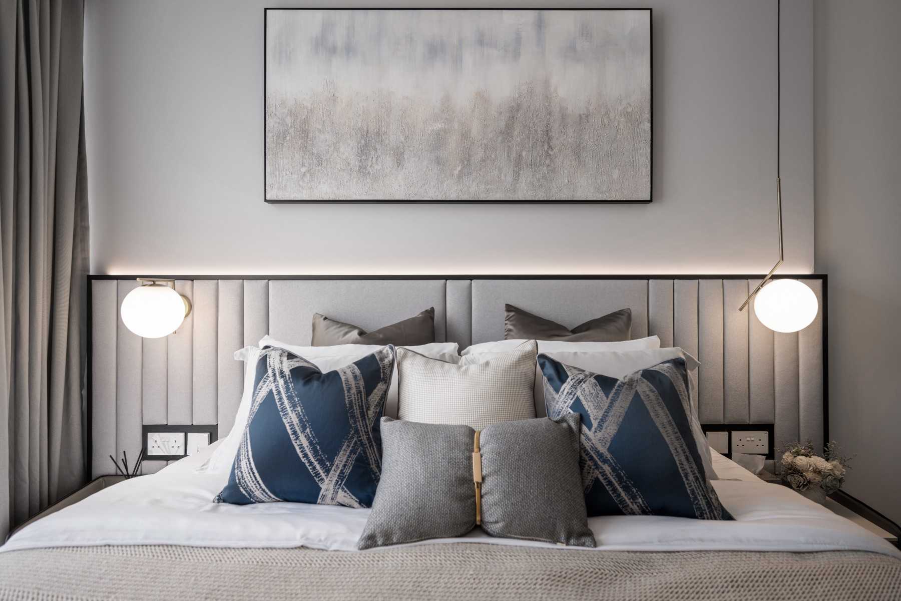 Contemporary Bedroom with Cove Lighting and Built-in Bed