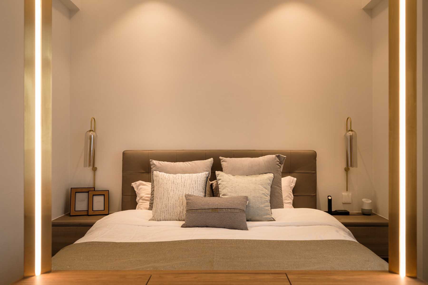 Transitional Bedroom with Cove Lighting and Bedside Table