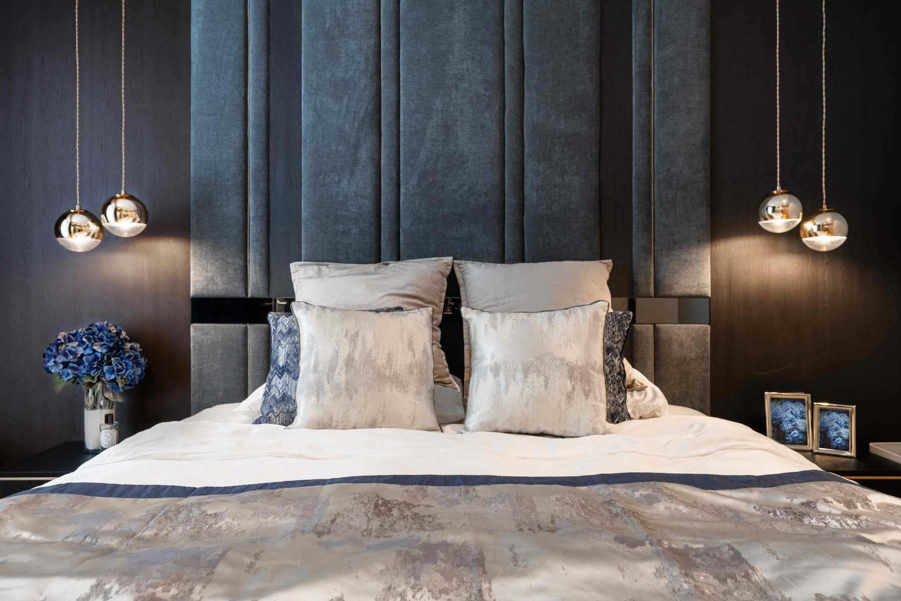 Modern Bedroom with Cove Lighting and Built-in Bed
