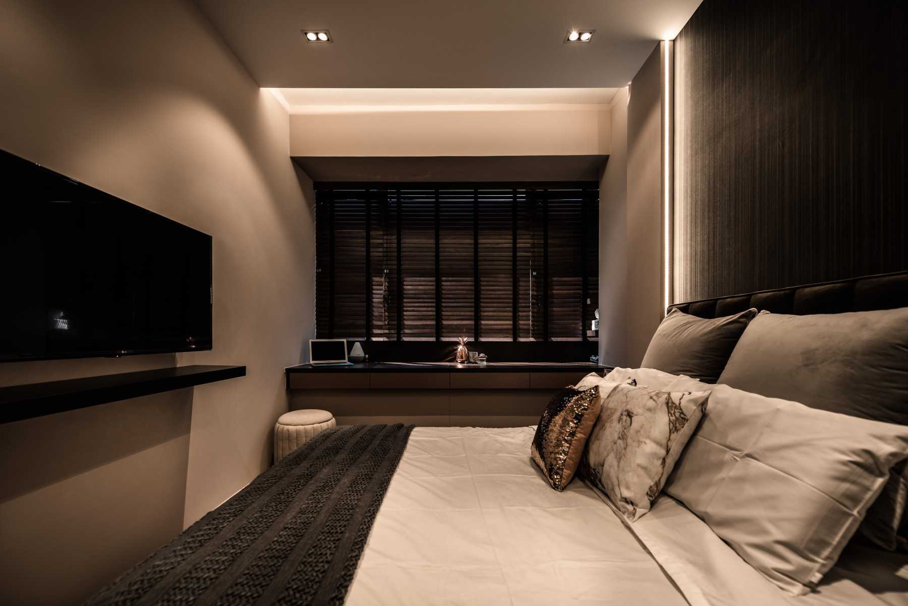 Modern Bedroom with Cove Lighting and Built-in Bed