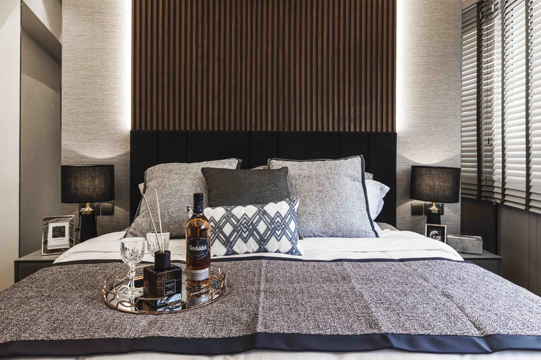 Transitional Bedroom with Cove Lighting and Bedside Table