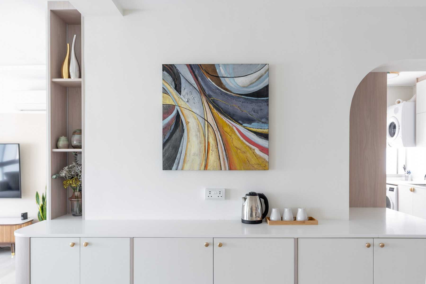 Minimalist Foyer with Artwork and Console Table