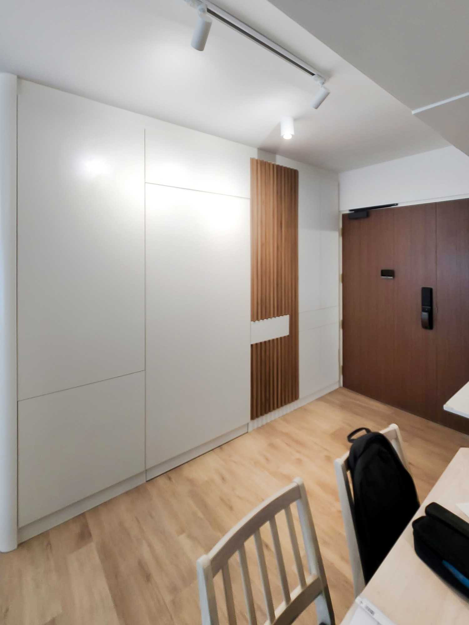 Scandinavian Foyer with Storage Cabinets and Display Cabinets