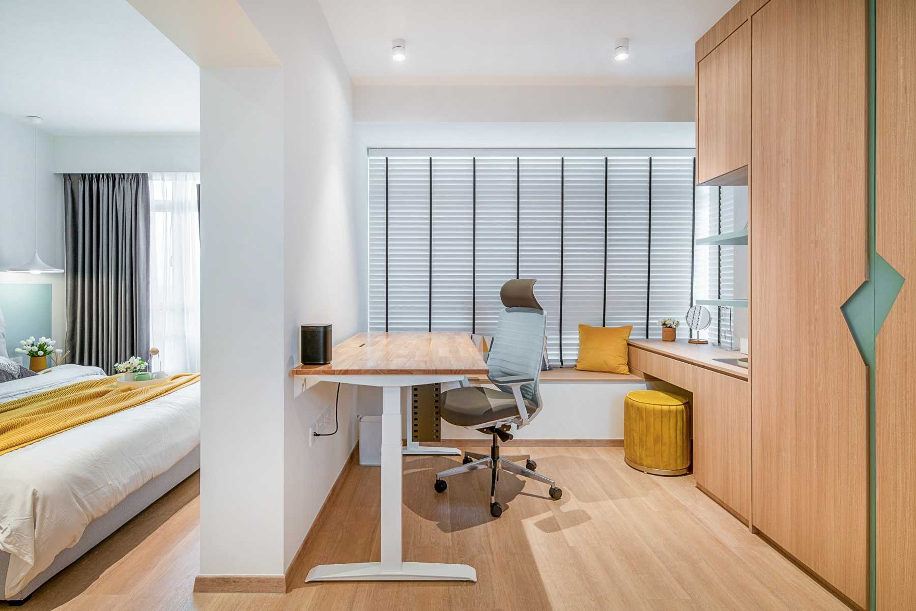 Scandinavian Study with Cove Lighting and Storage Cabinets