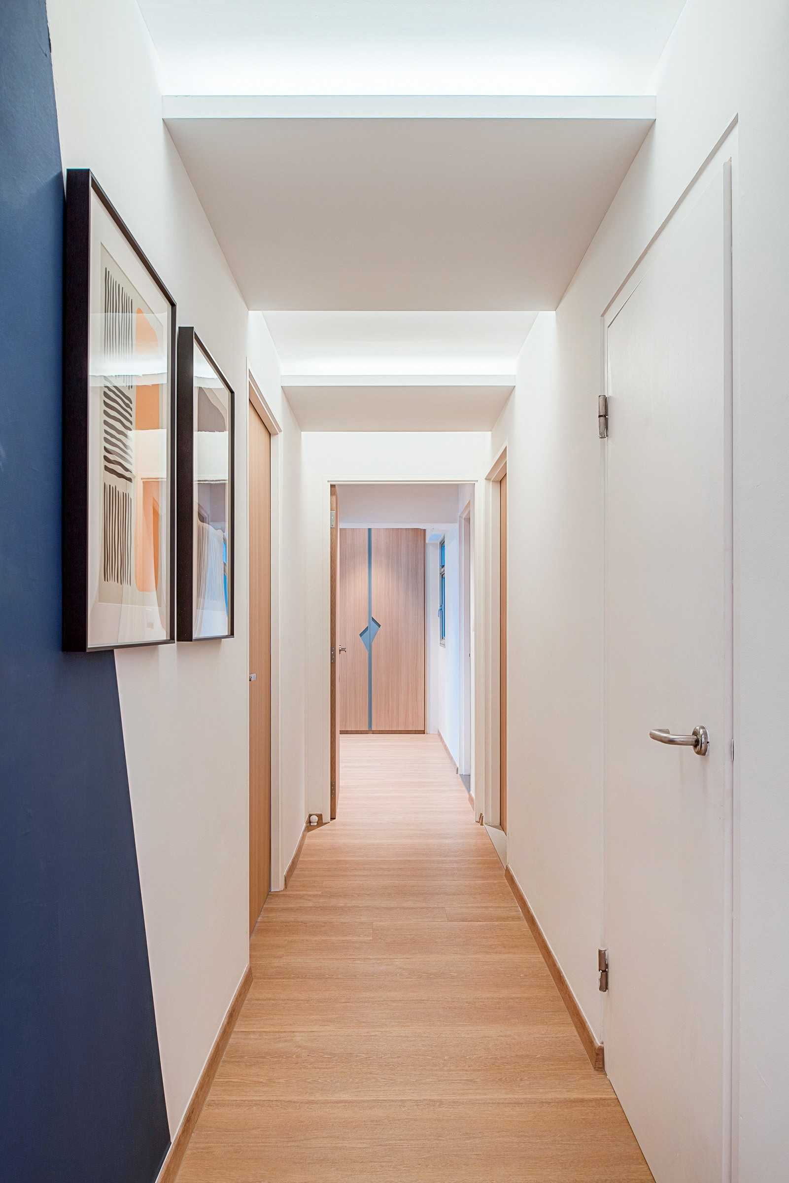 Scandinavian Hallway with Bookshelf and Artwork