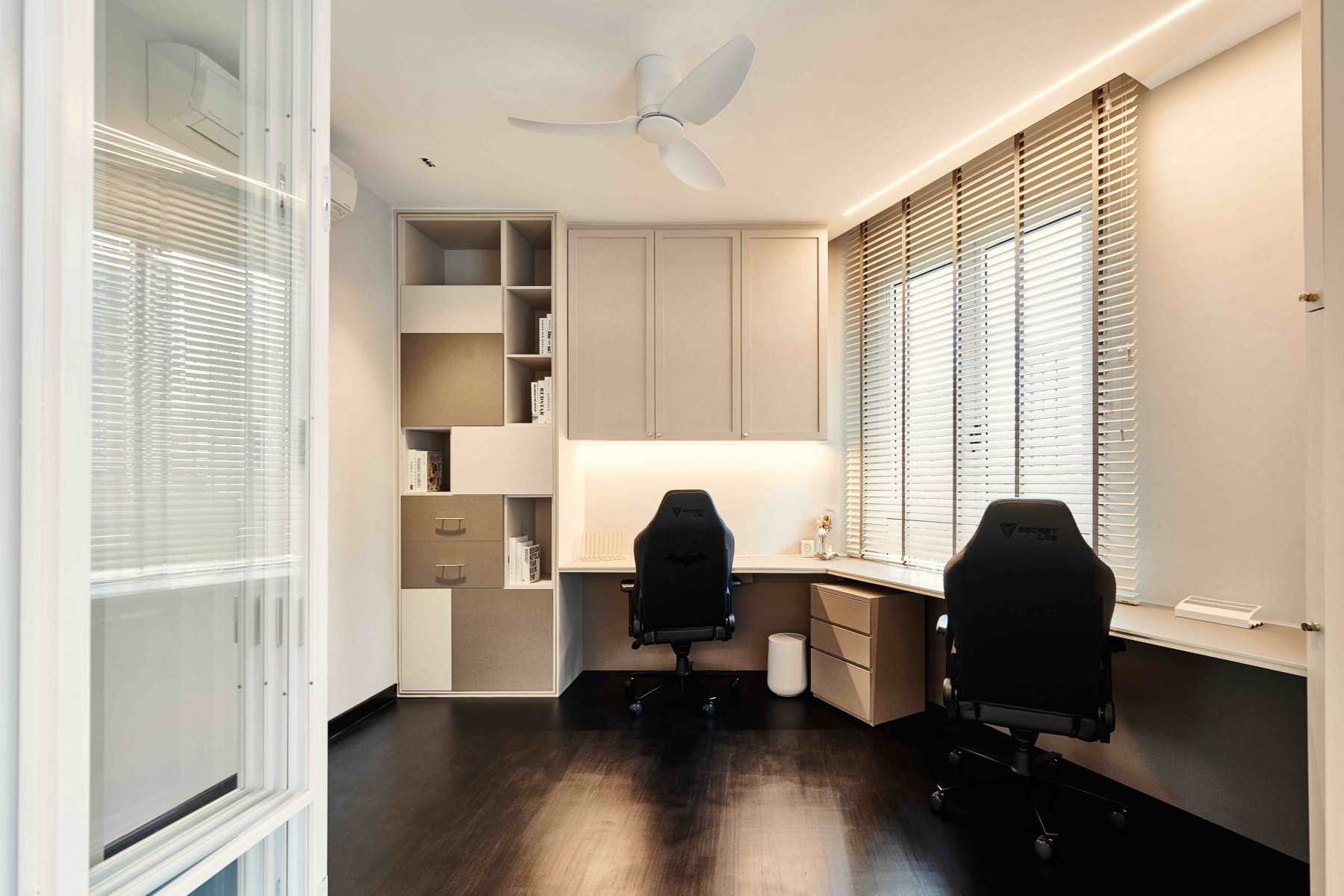 Modern Study with Cove Lighting and Desk