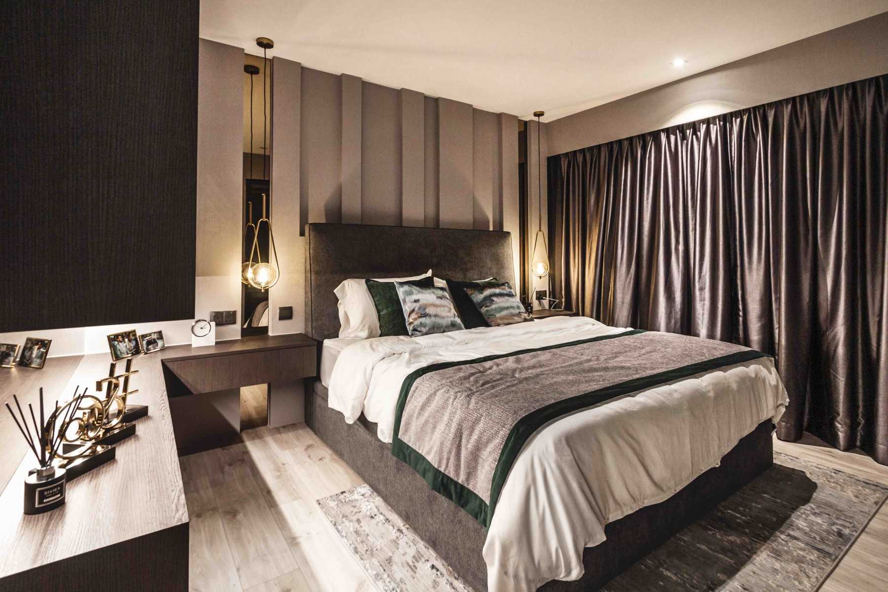 Modern Bedroom with Cove Lighting and Bedside Table