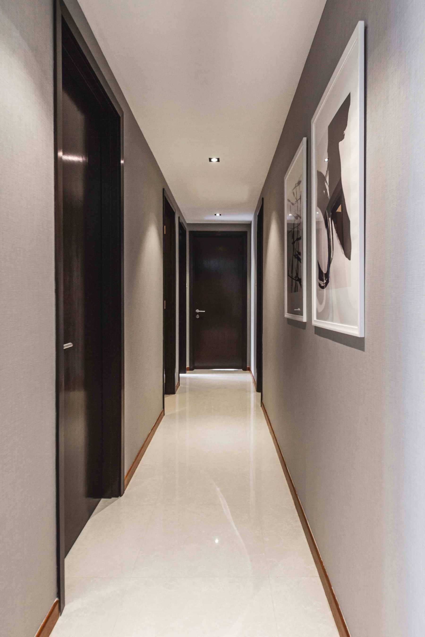 Contemporary Foyer with Artwork and Console Table