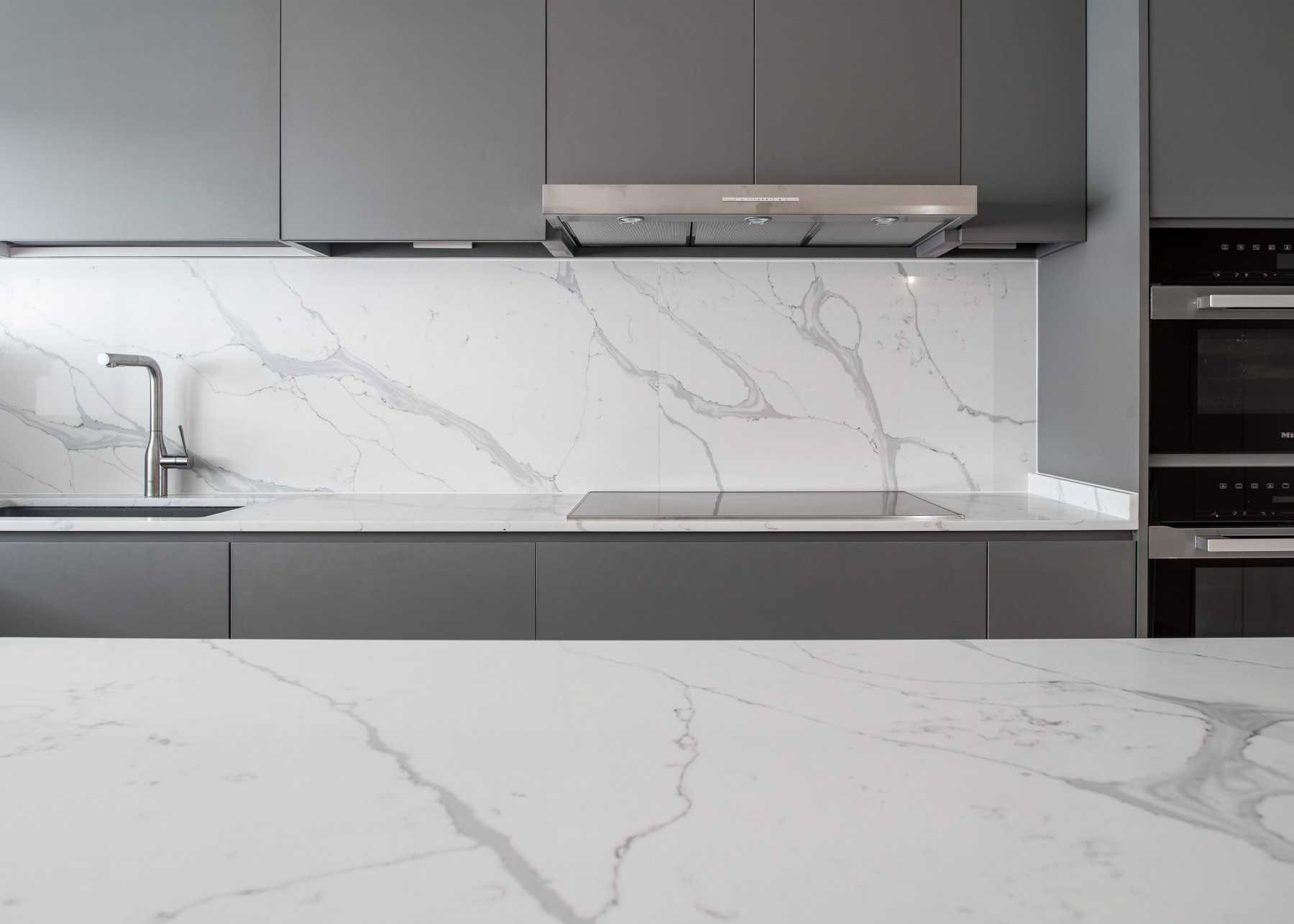 Minimalist Kitchen with Kitchen Island and Breakfast Counter