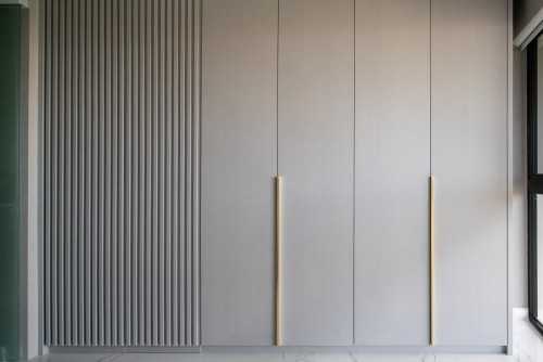 Minimalist Walk-in Wardrobe at Dakota Crescent Maisonette