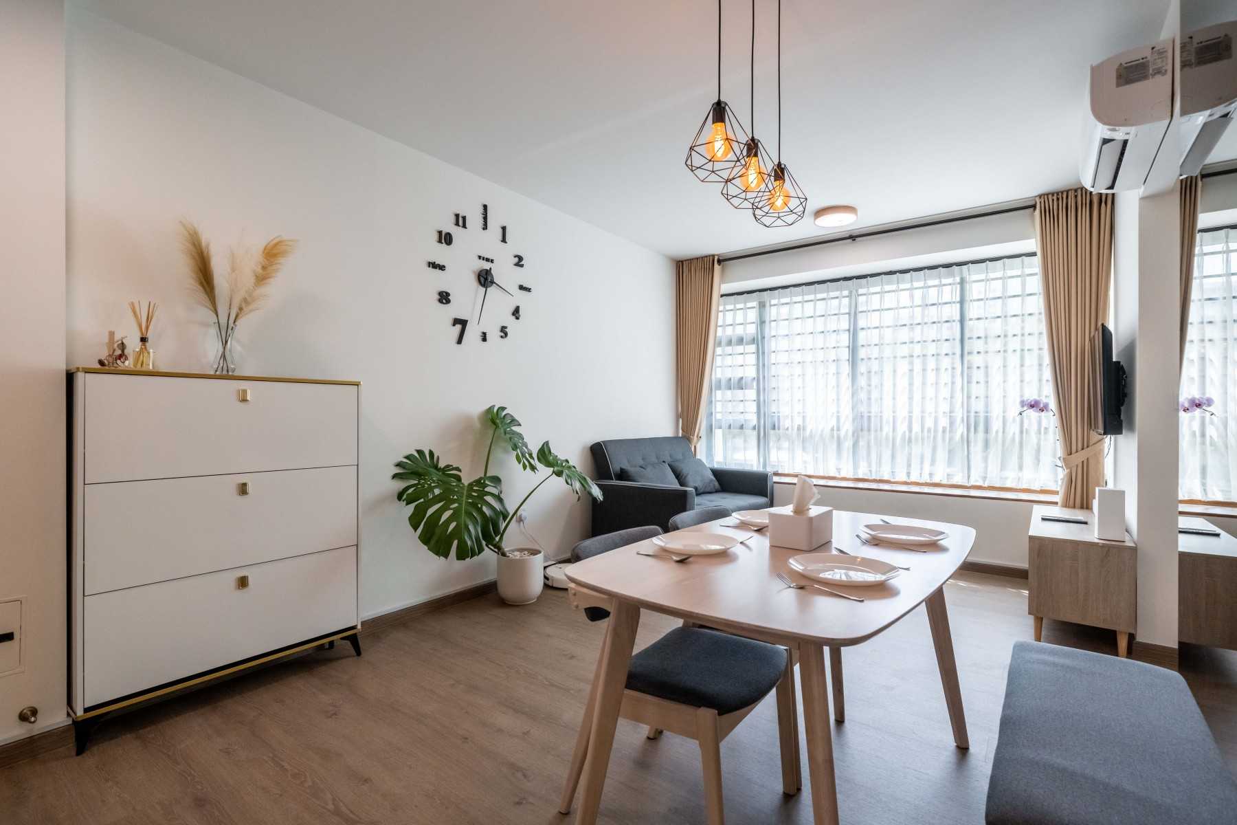 Contemporary Dining Room with Drop Light and Dining Table