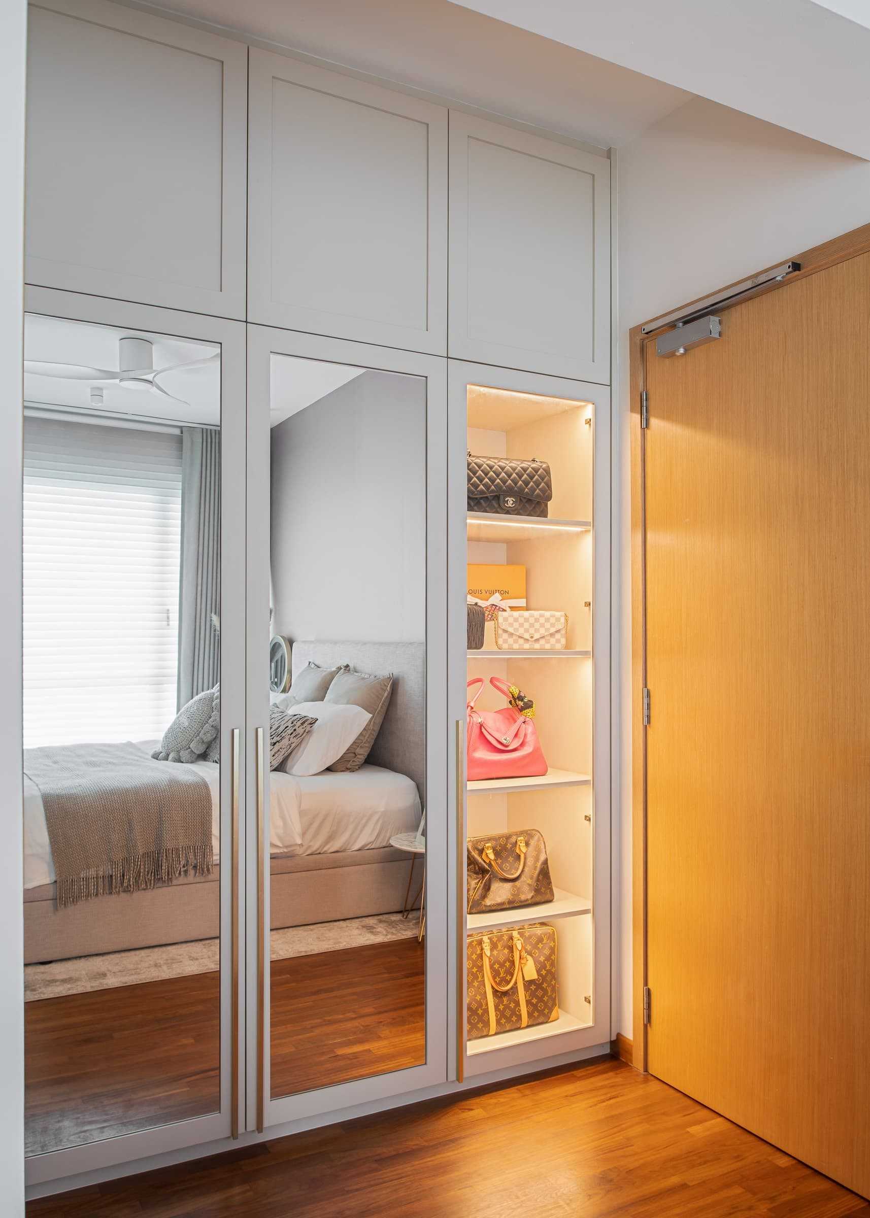 Contemporary Bedroom with Wood Flooring and Closet
