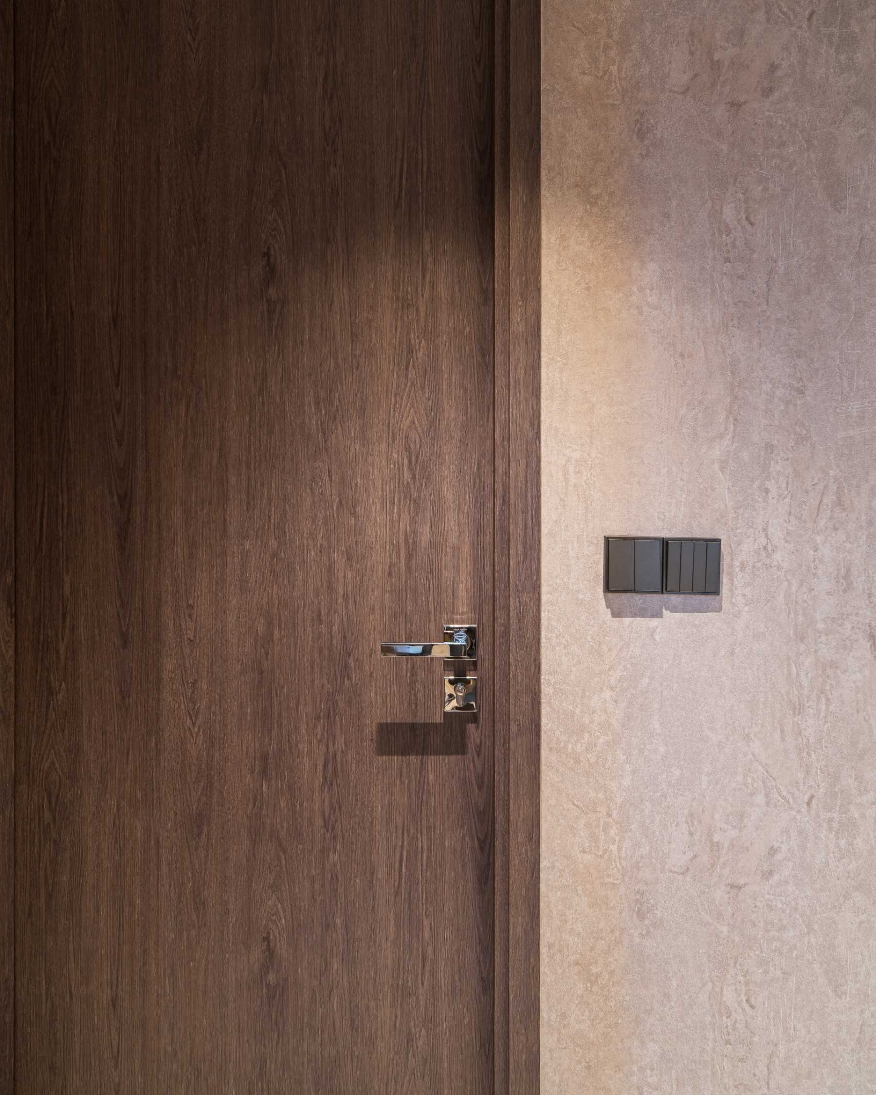Contemporary Hallway with Bookshelf and Artwork