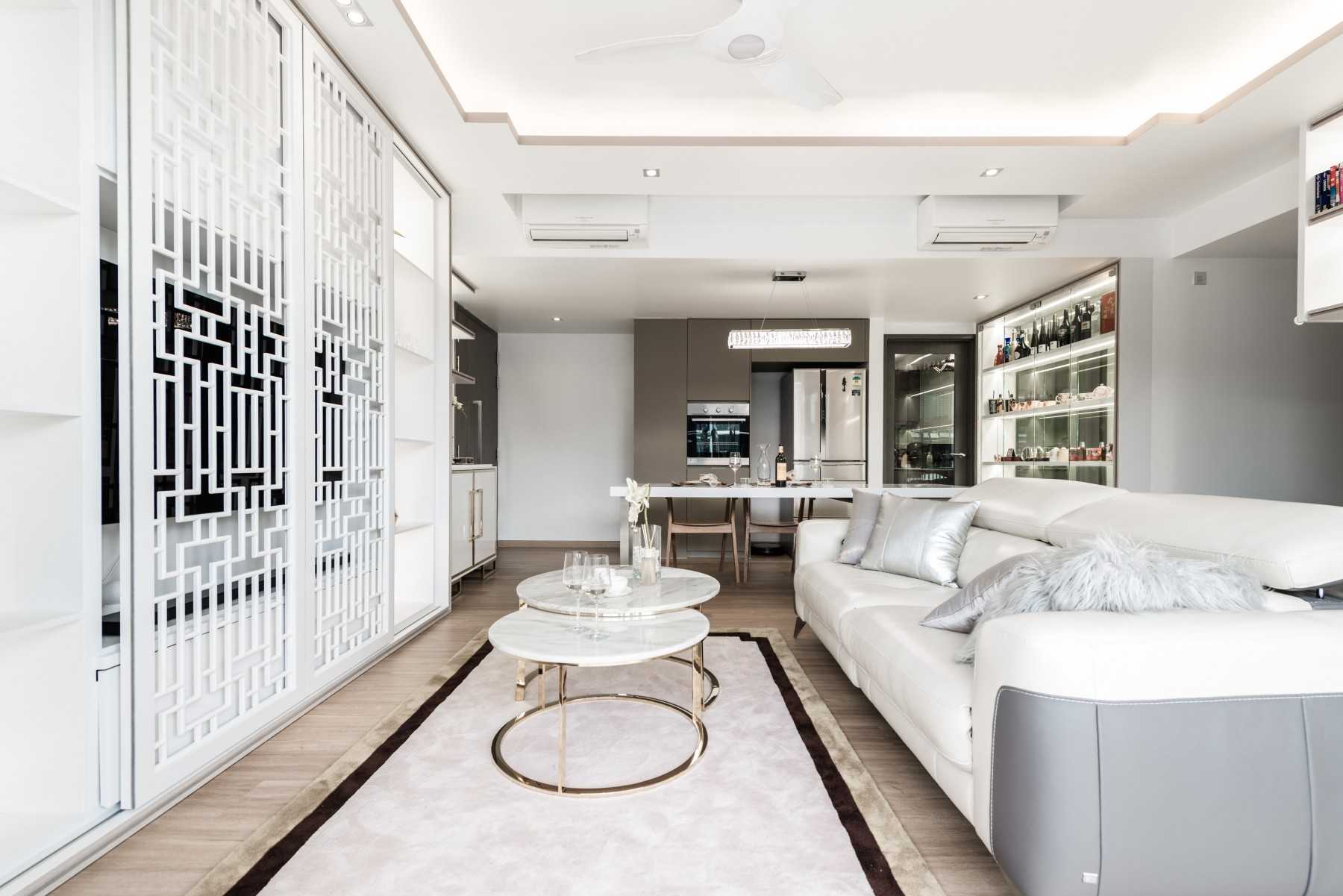 Asian Living Room with Cove Lighting and Sofa