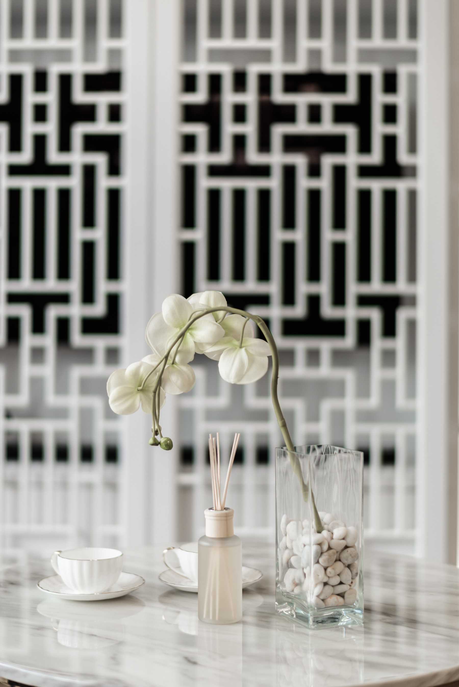 Asian Living Room with TV Console and Feature Wall