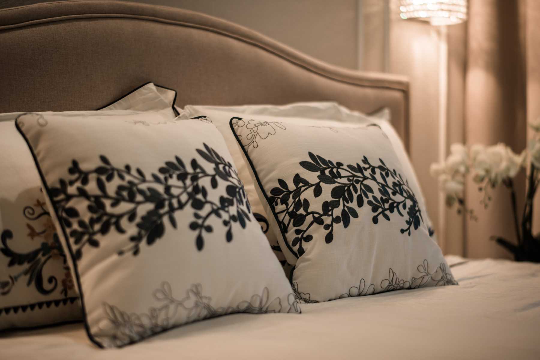 Asian Bedroom with Cove Lighting and Bedside Table