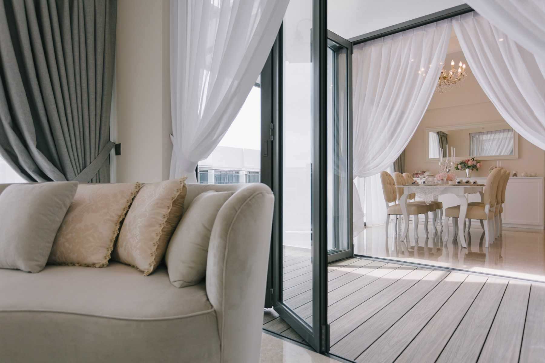Transitional Porch with Window Seat and Awning