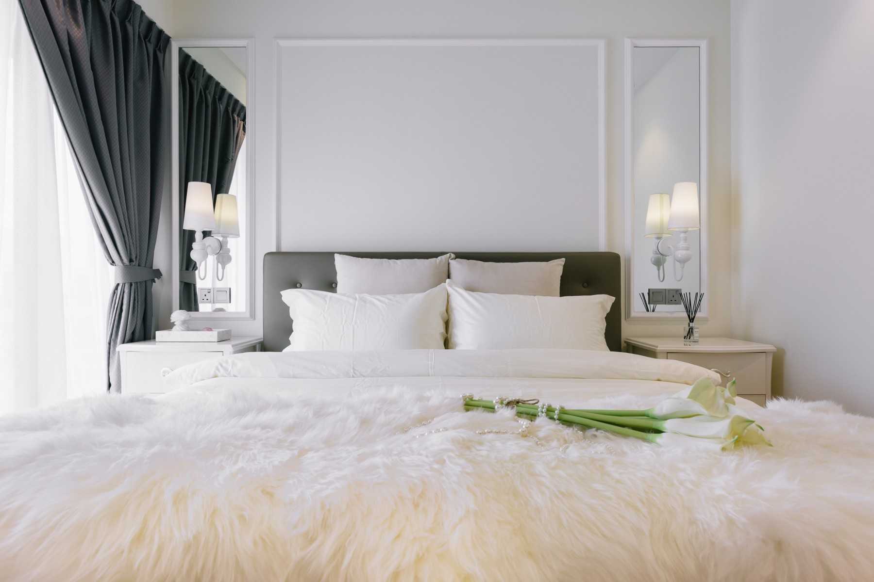 Transitional Bedroom with Cove Lighting and Bedside Table