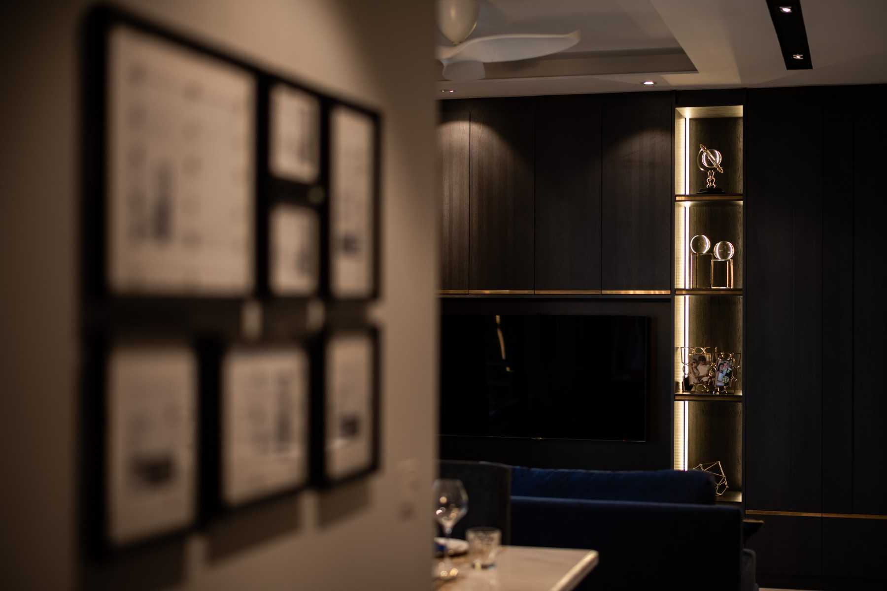 Contemporary Living Room with Feature Wall and Cove Lighting