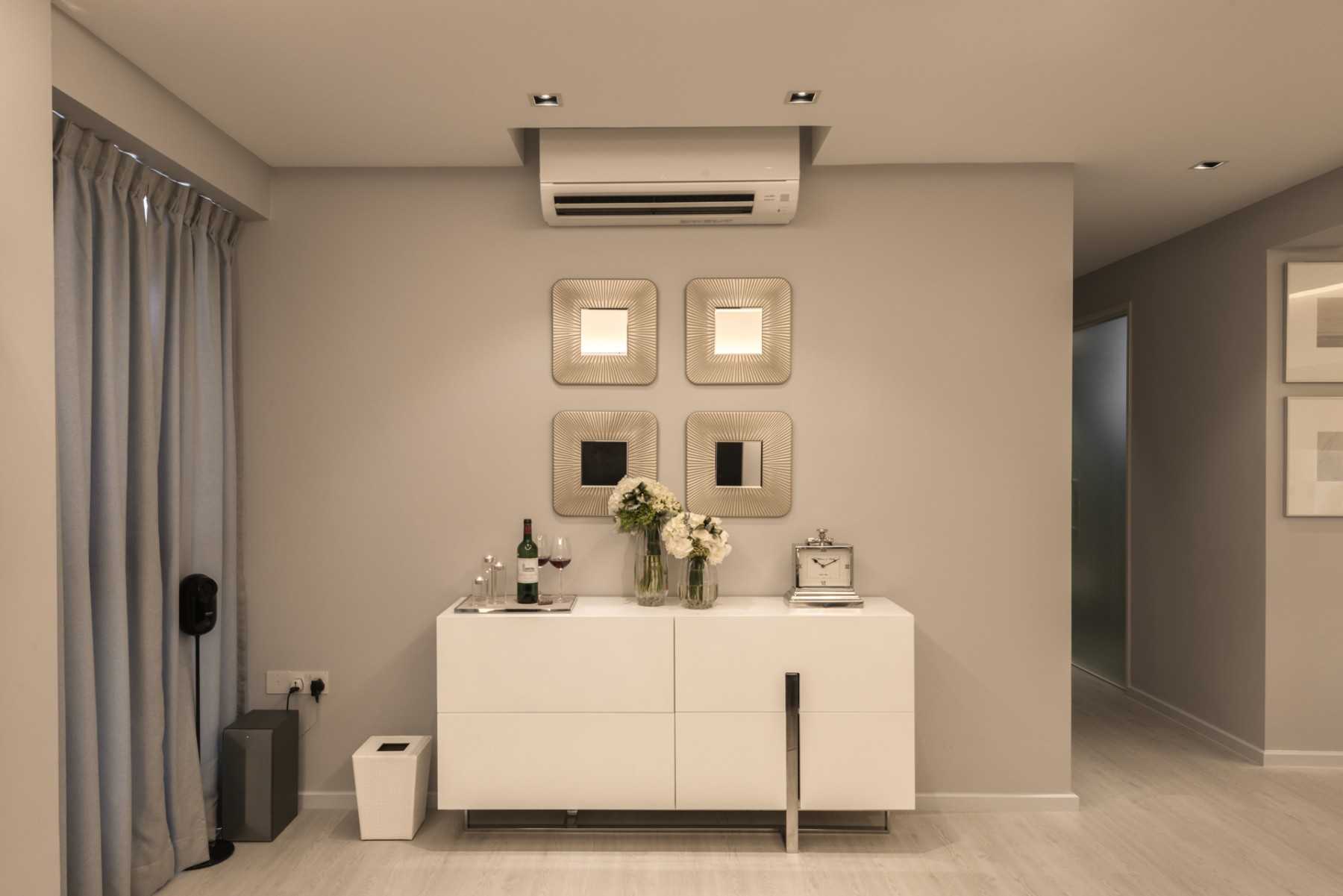 Contemporary Foyer with Artwork and Console Table