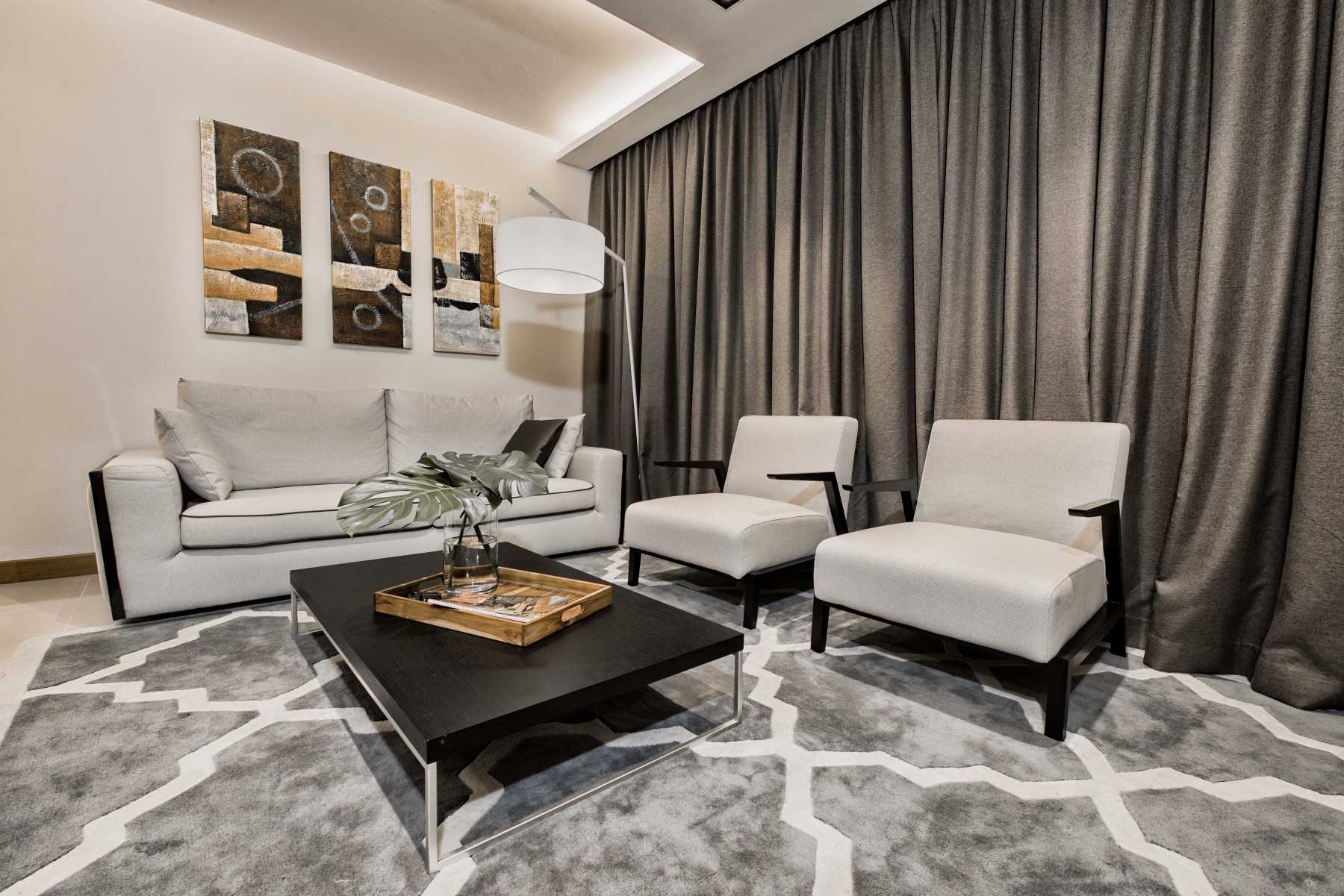 Contemporary Living Room with Cove Lighting and Sofa