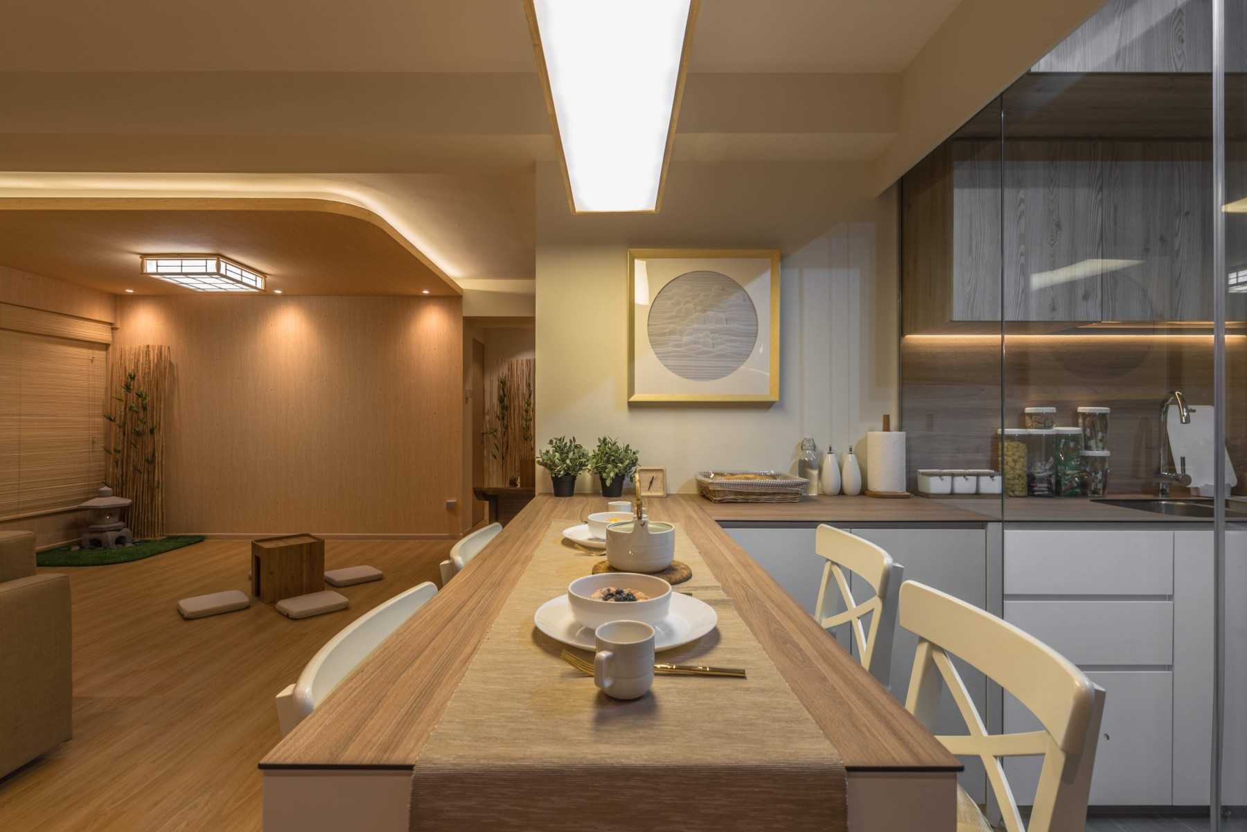 Asian Dining Room with Cove Lighting and Dining Table