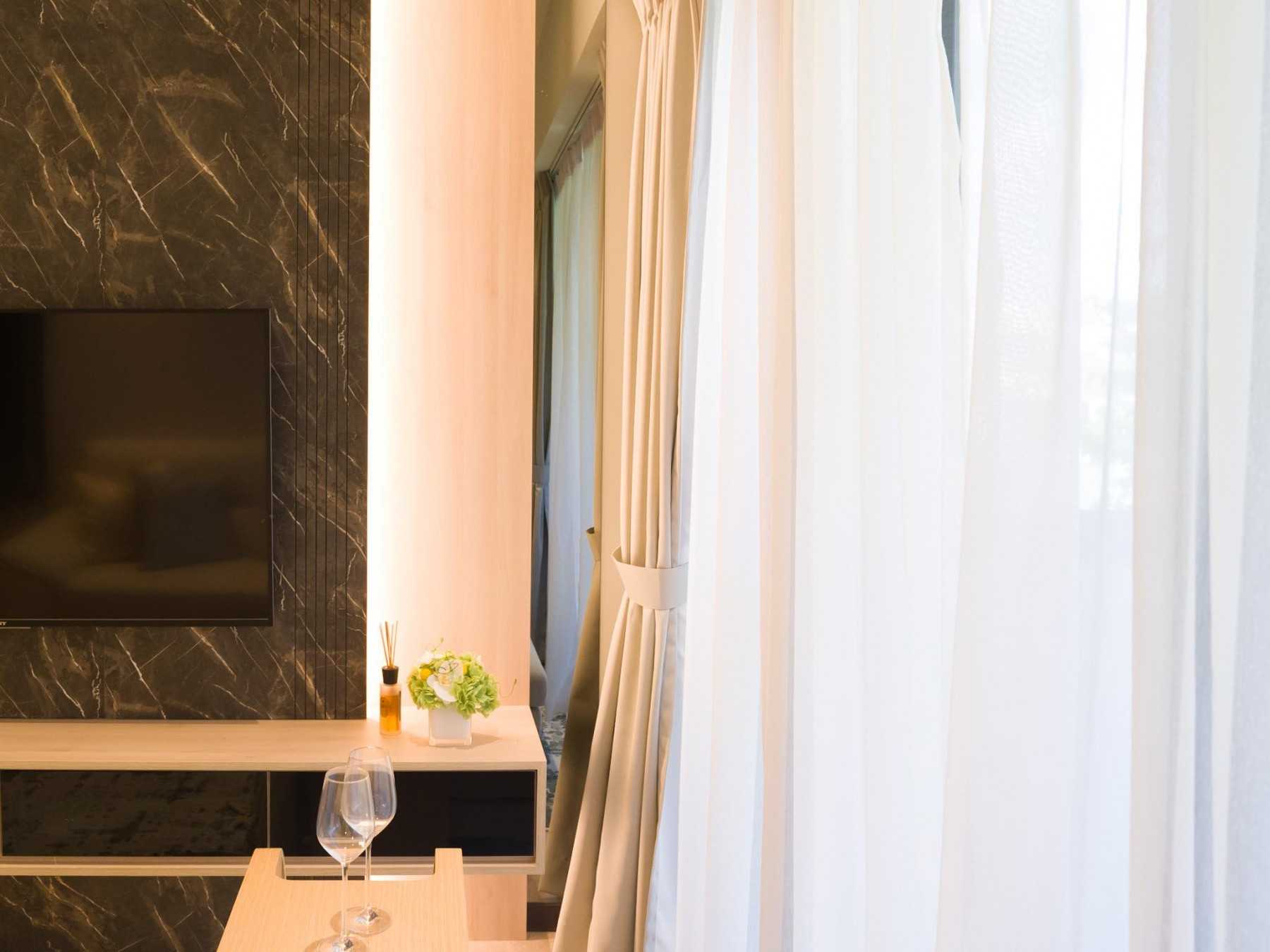 Modern Living Room with TV Console and Feature Wall
