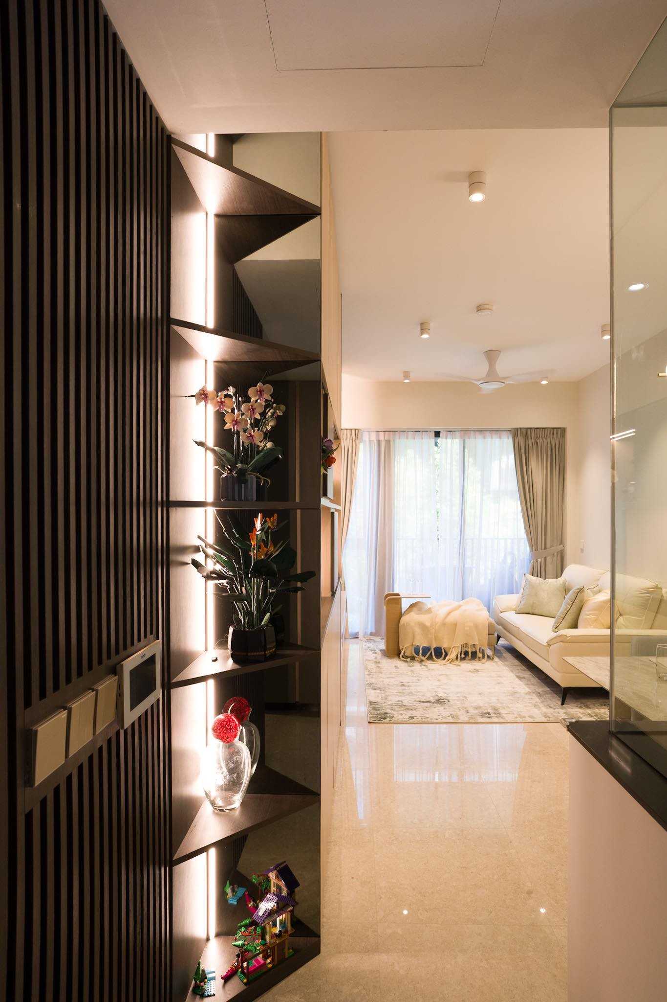 Modern Entryway with Bookshelf and Small Storage