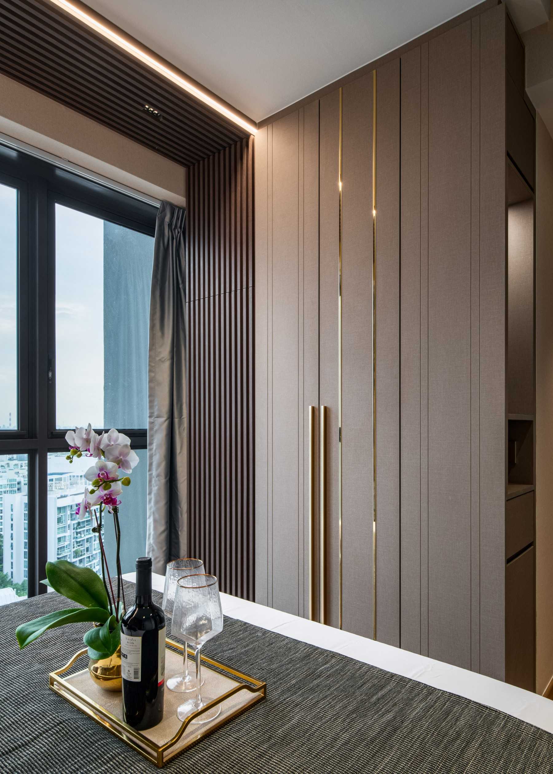 Contemporary Bedroom with Cove Lighting and Wardrobe