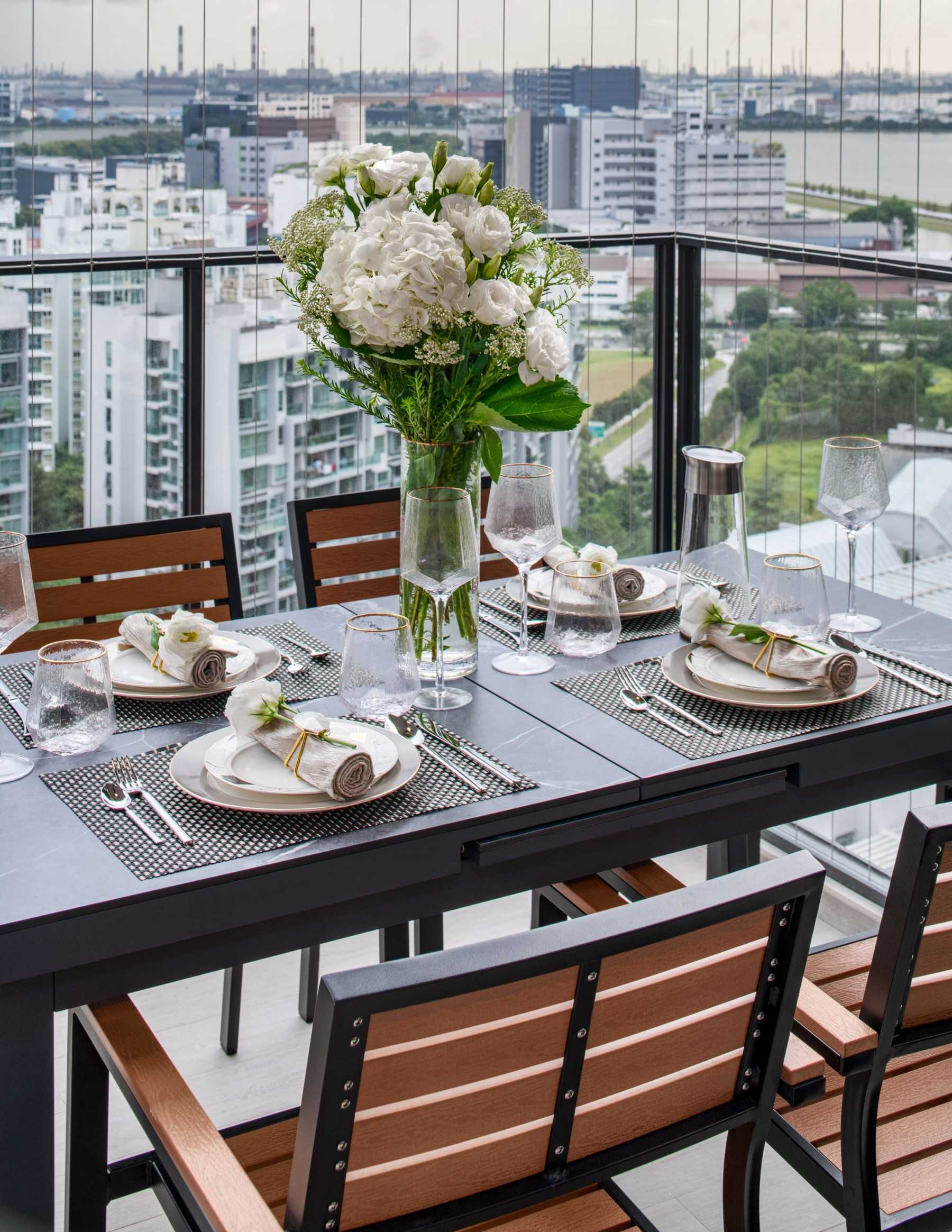 Contemporary Balcony with Window Grille and Outdoor Table