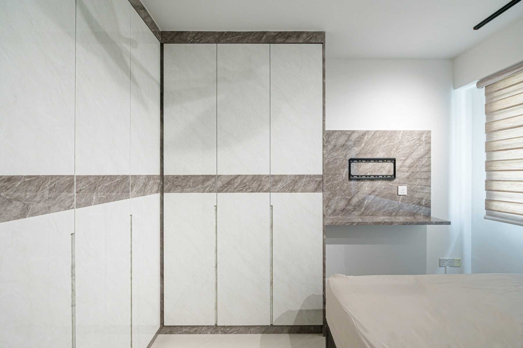 Modern Bedroom with Homogeneous Tiles and Wardrobe