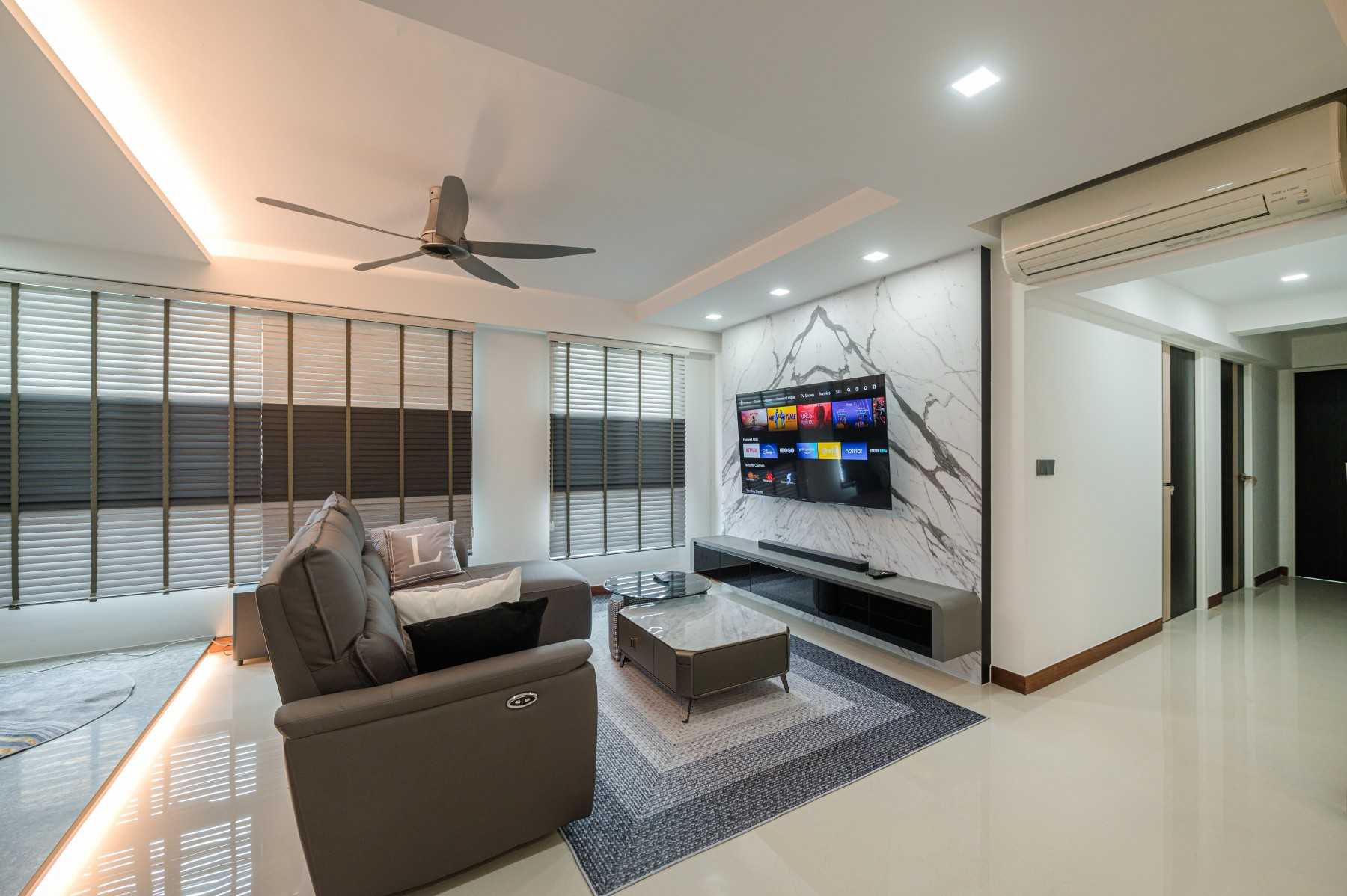 Modern Living Room with Homogeneous Tiles and TV Console