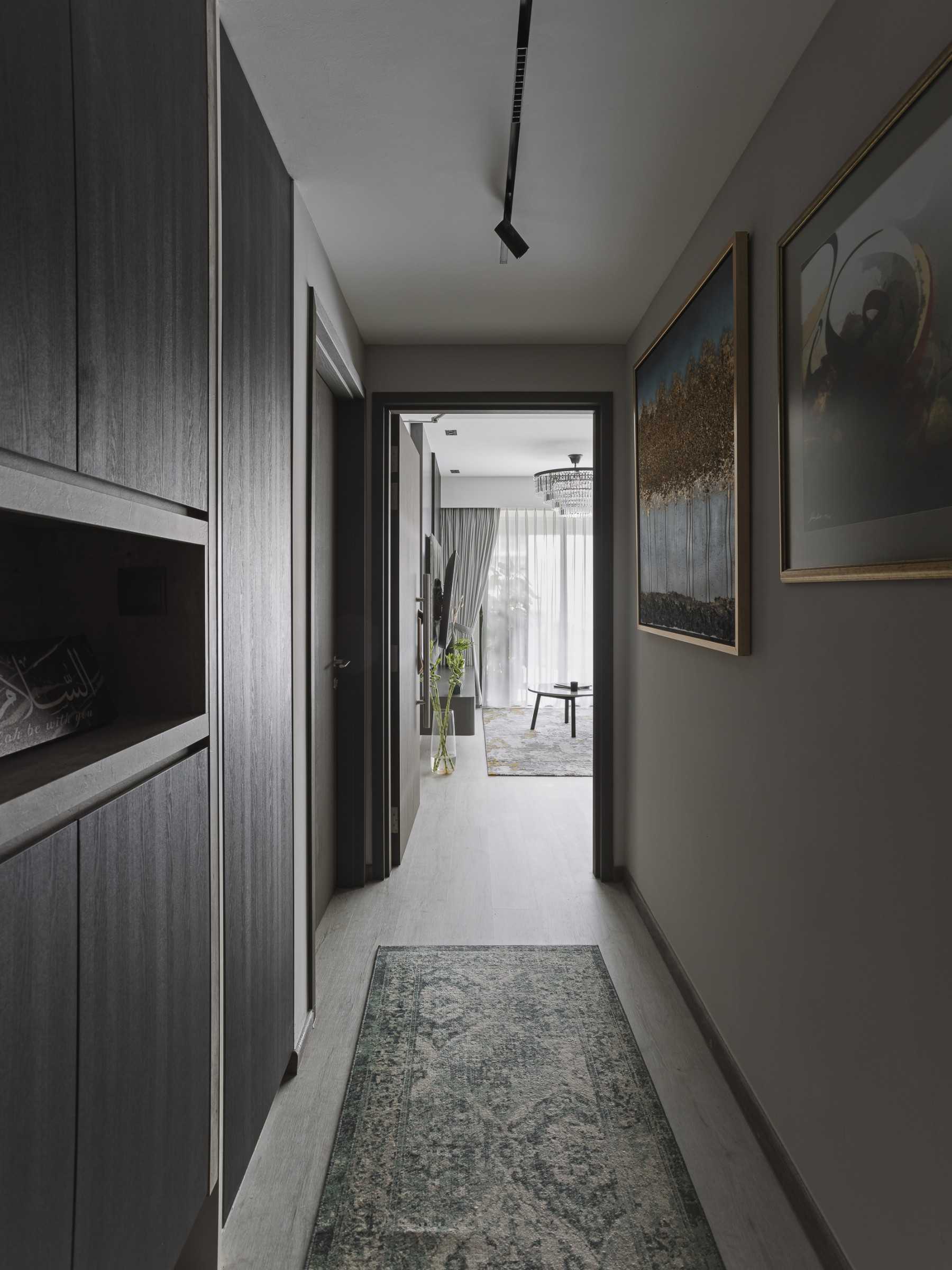 Modern Entryway with Artwork and Small Storage