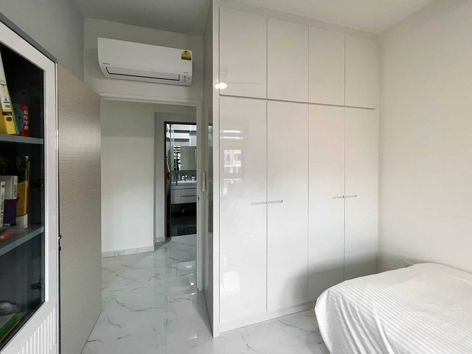 Modern Bedroom with Wardrobe and Storage Cabinets