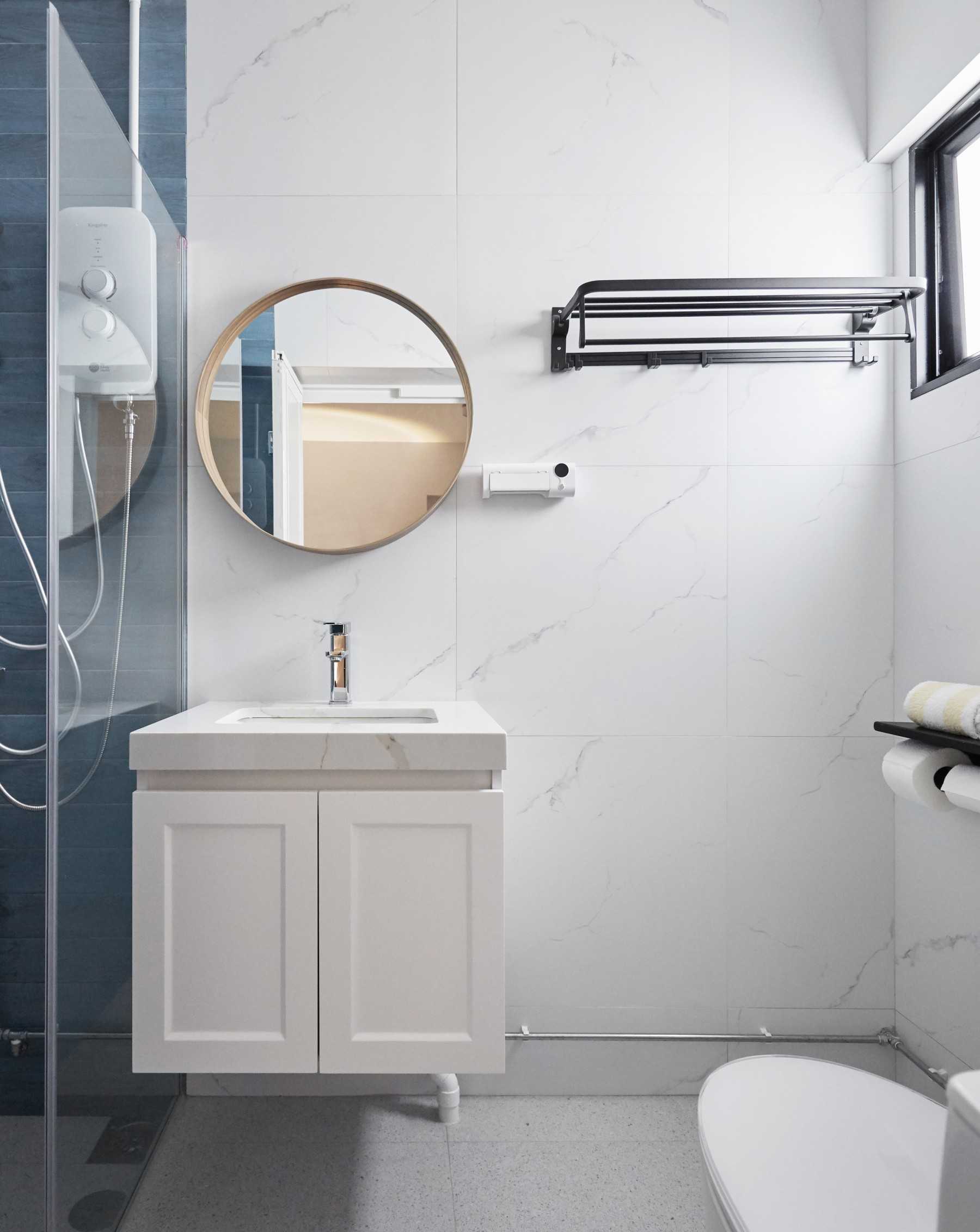 Modern Bathroom with Cement Floor and Mirror