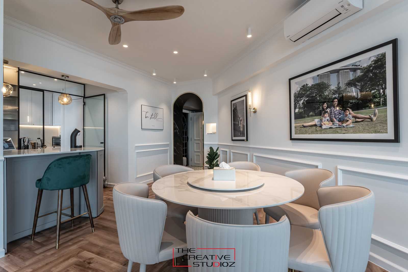 Contemporary Dining Room with Drop Light and Cove Lighting