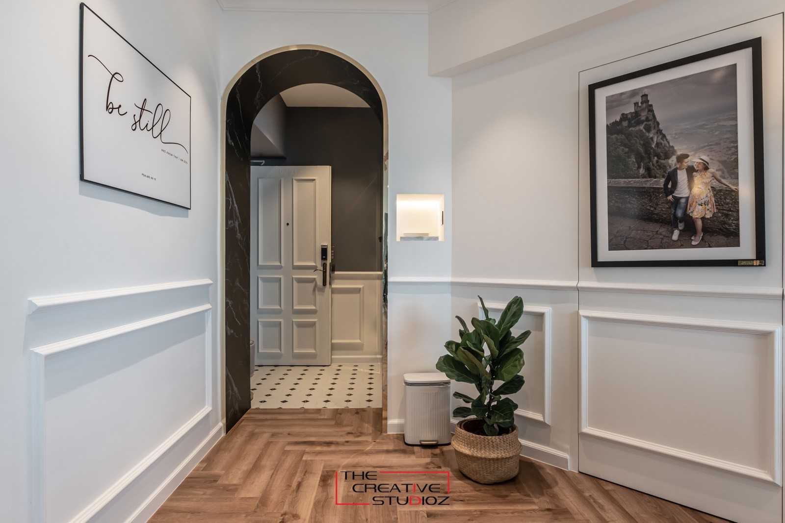 Contemporary Foyer with Artwork and Console Table