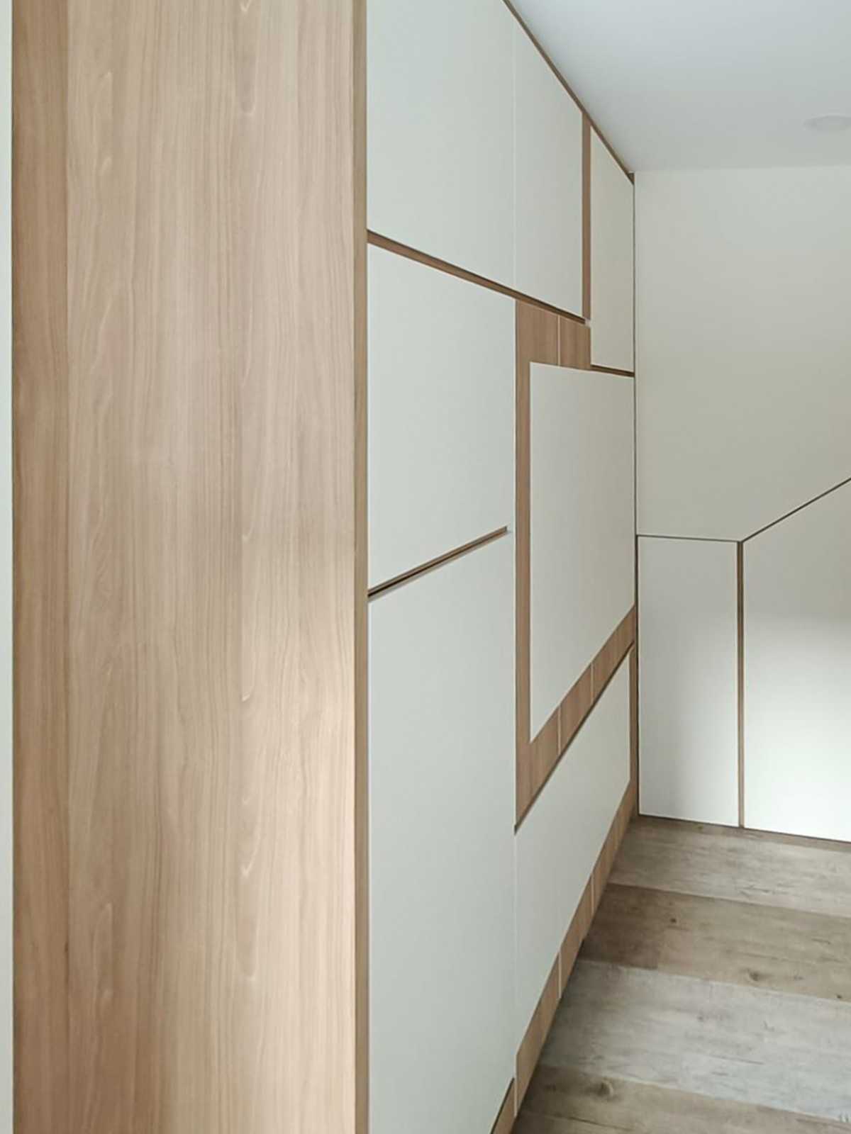 Scandinavian Bedroom with Wardrobe and Paintings