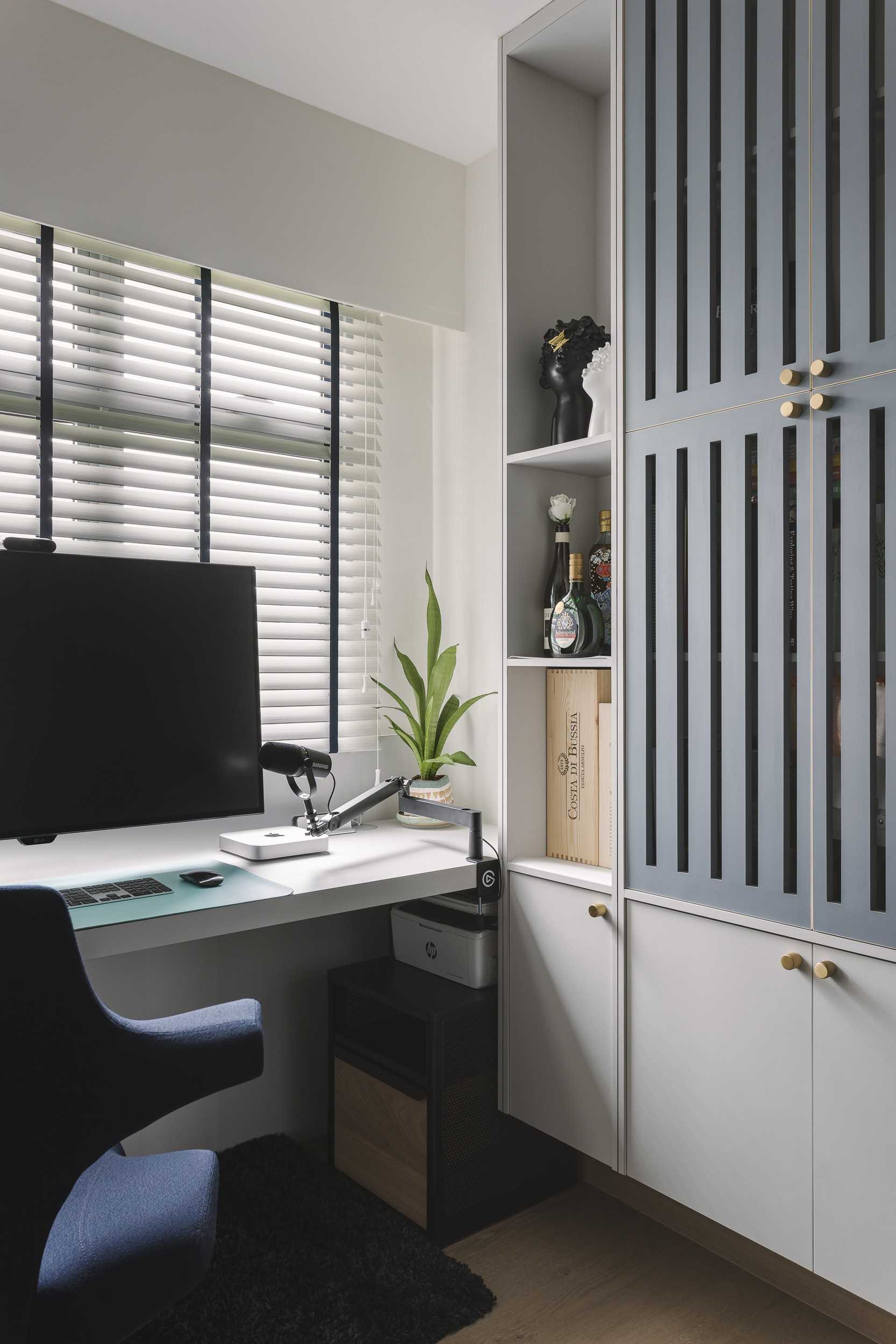 Contemporary Home Office with Desk and Desk Chairs