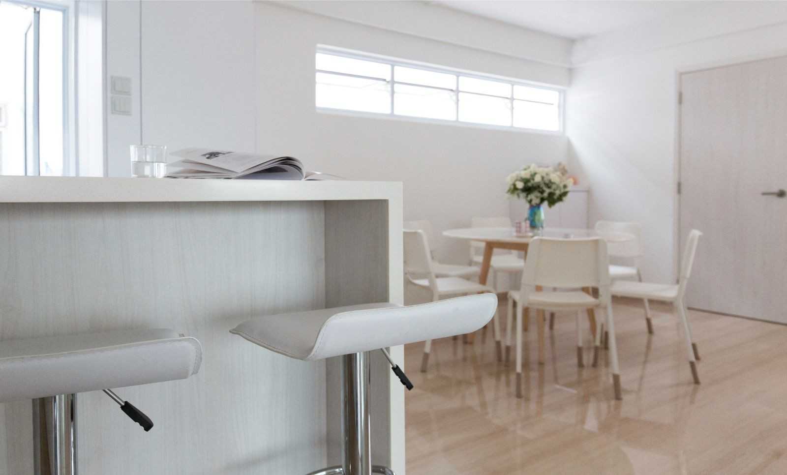 Minimalist Dining Room with Bar Counter and Dining Table