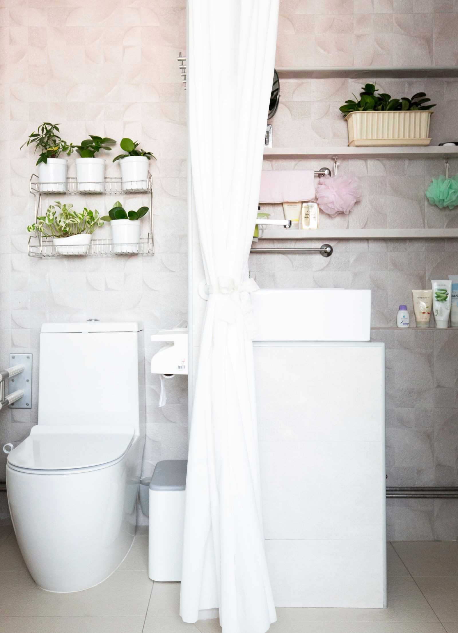 Minimalist Bathroom with Marble Floor and Bathroom Accessories