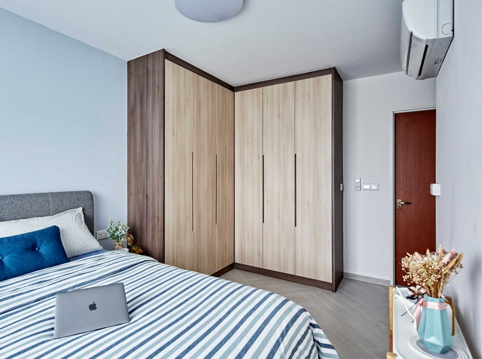 Contemporary Bedroom with Wood Flooring and Wardrobe