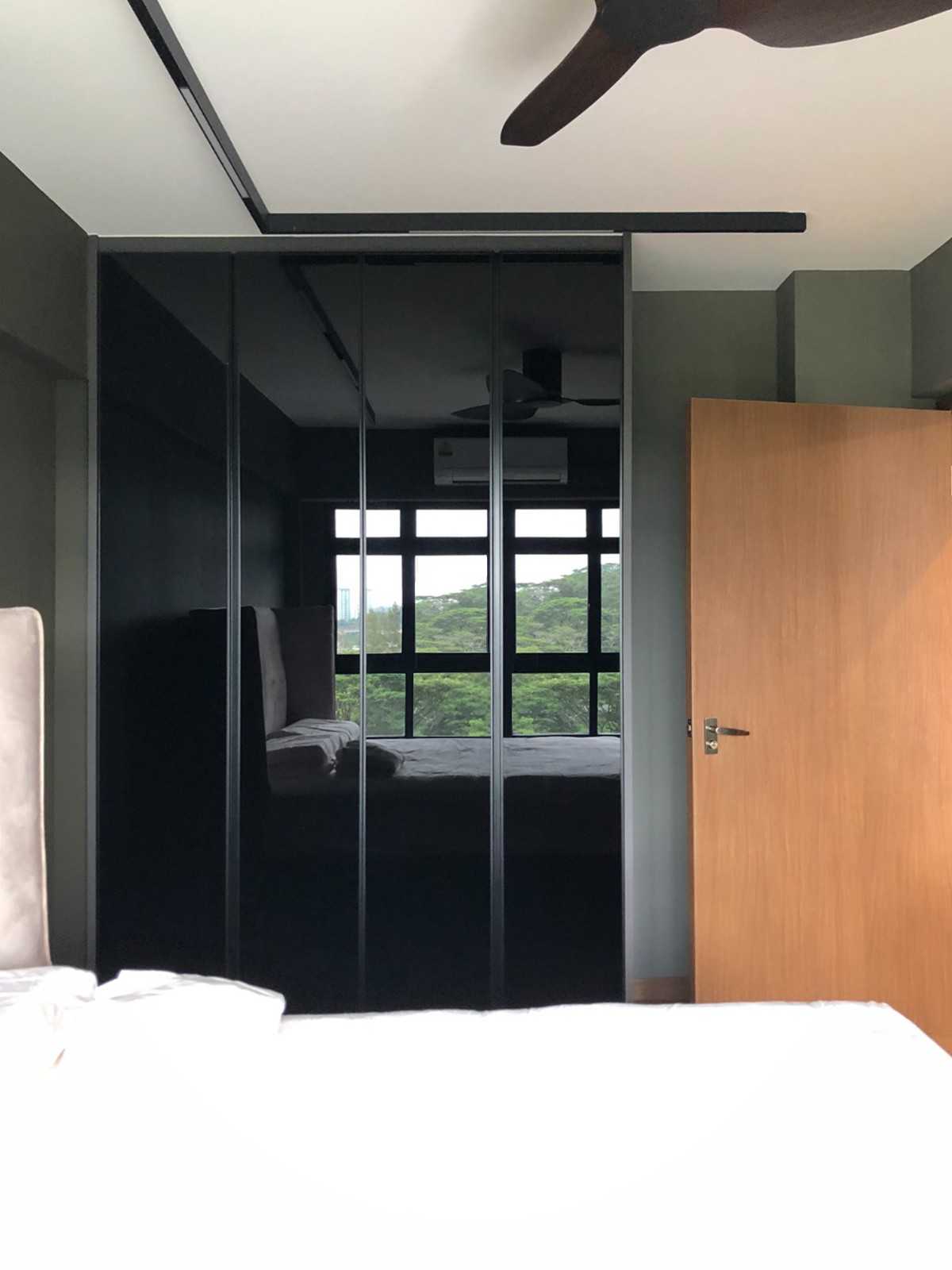 Modern Bedroom with Wardrobe and Paintings