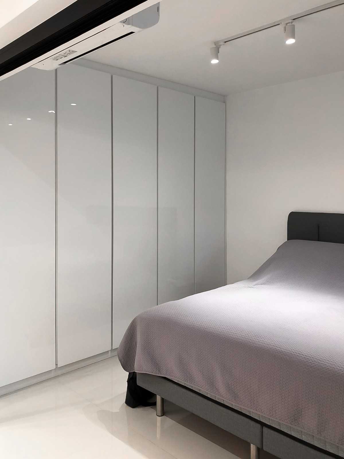 Scandinavian Bedroom with Kitchen Window and Wardrobe