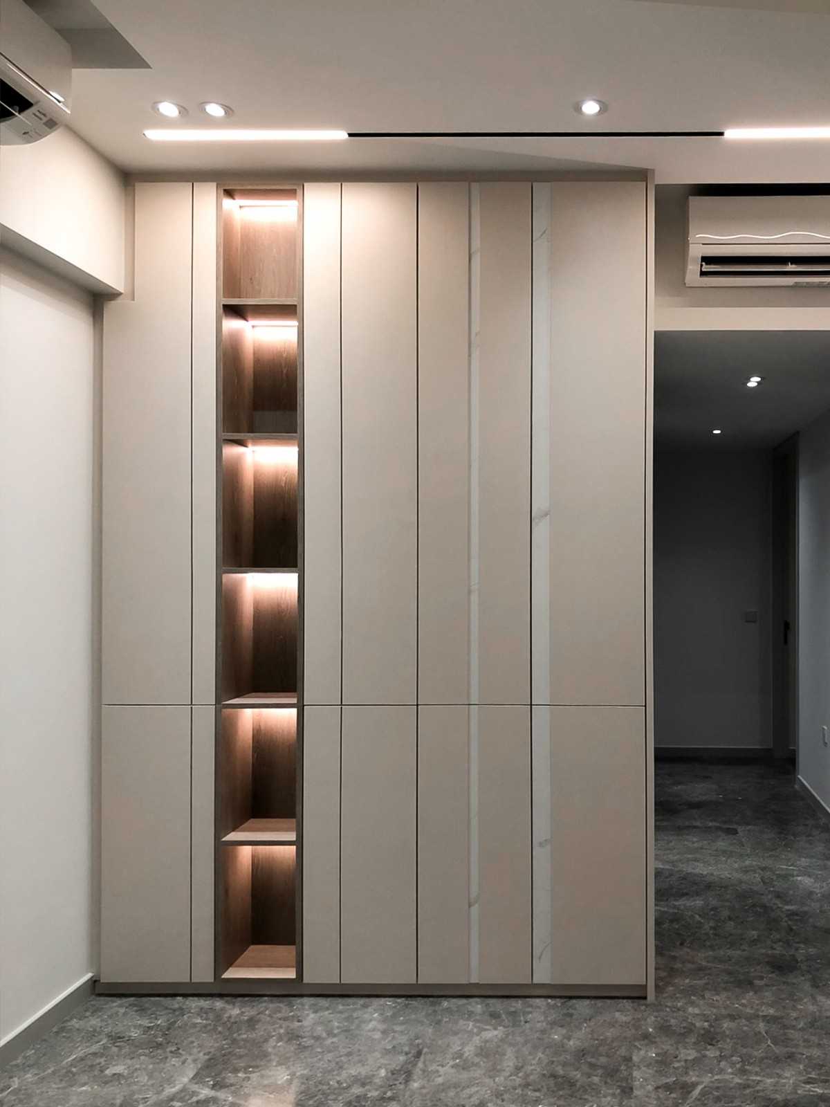 Scandinavian Foyer with Paintings and Storage Cabinets