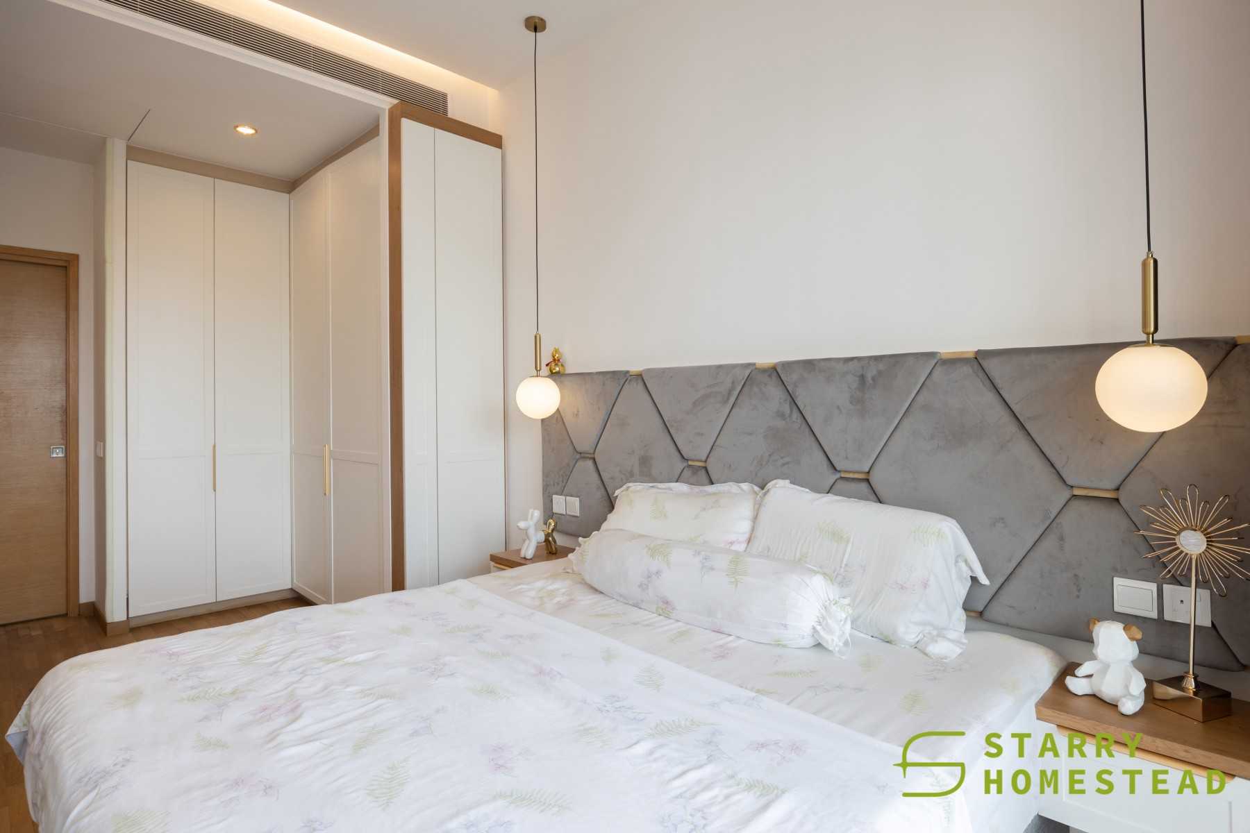 Scandinavian Bedroom with Wood Flooring and Drop Light