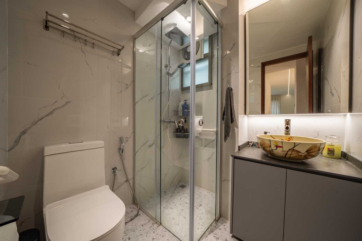 Asian Bathroom with Homogeneous Tiles and Mirror